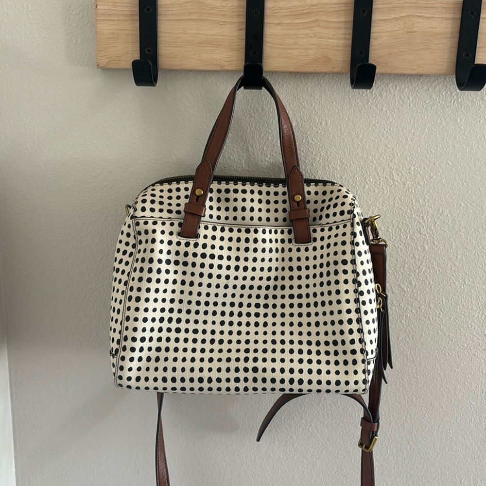 black dotted Fossil purse with wallet included